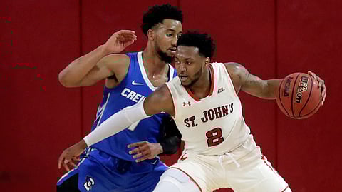 Creighton’s Davion Mintz (1) defends St. John’s Shamorie Ponds (2) during the first half of an NCAA college basketball game Wednesday, Jan. 16, 2019, in New York. (AP Photo/Frank Franklin II)
