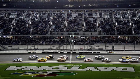 Alex Bowman (88) leads the field during start of the second NASCAR Daytona 500 qualifying race Thursday, Feb. 14, 2019. (AP Photo/Chris O’Meara)