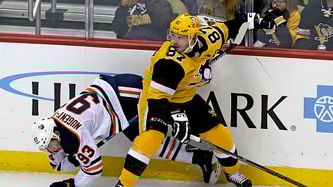 Pittsburgh Penguins’ Sidney Crosby (87) collides with Edmonton Oilers’ Ryan Nugent-Hopkins (93) in Pittsburgh, Wednesday, Feb. 13, 2019. (AP Photo/Gene J. Puskar)