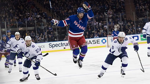 New York Rangers left wing Chris Kreider (20) jumps while chasing a loose puck during the second period of an NHL hockey game, Saturday against the Tampa Bay Lightning, Feb. 2, 2019, at Madison Square Garden in New York. (AP Photo/Mary Altaffer)
