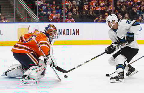 Oilers’ goaltender Cam Talbot (left) has been dealt to the Flyers