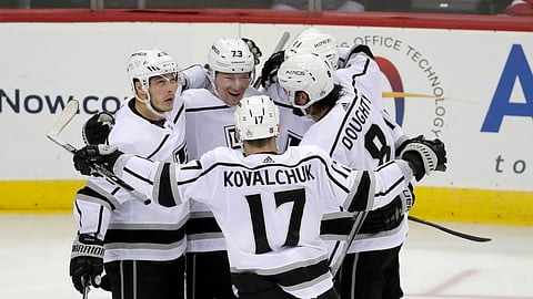 Los Angeles Kings celebrate a third-period goal by Tyler Toffoli (second from left) in New Jersey Tuesday.