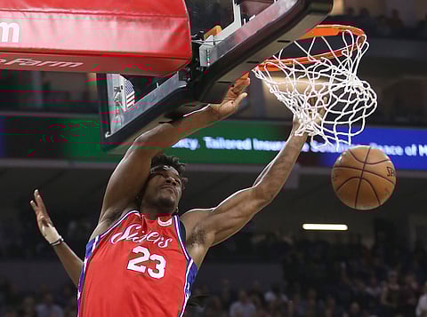 Sixers’ Jimmy Butler dunks against the Sacramento Kings in early February