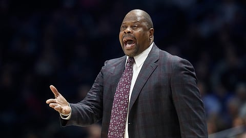 Georgetown head coach Patrick Ewing reacts at the bench during the first half of an NCAA college basketball game against Xavier, Wednesday, Jan. 9, 2019, in Cincinnati. (AP Photo/John Minchillo)