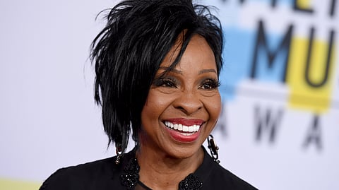 FILE - In this Oct. 9, 2018 file photo, Gladys Knight arrives at the American Music Awards at the Microsoft Theater in Los Angeles. The seven-time Grammy Award-winner will sing “The Star-Spangled Banner” at this year’s Super Bowl, Sunday, Feb. 3, 2019. Knight says she’s proud to use her voice to “unite and represent our country” in her hometown of Atlanta.(Photo by Jordan Strauss/Invision/AP, File)