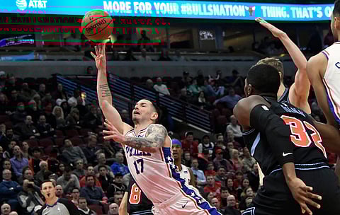 the Sixers’ JJ Redick drives to the hoop Wednesday against the Bulls (David Banks)