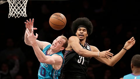 Charlotte’s Cody Zeller (left) and Brooklyn’s Jarrett Allen battle Friday (Seth Wenig)