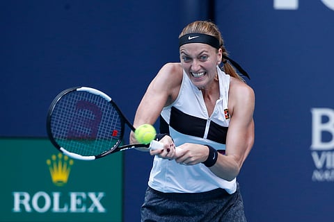 Petra Kvitova returns a volley to Caroline Garcia Monday (Joel Auerbach)