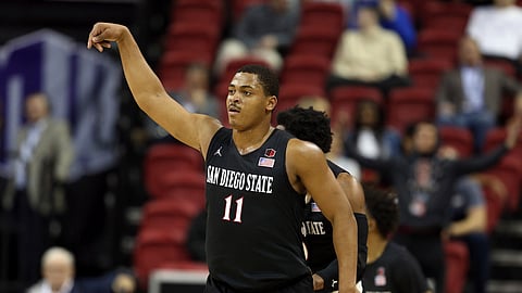 San Diego State’s Matt Mitchell reacts after sinking a three-pointer Friday against  Nevada (Isaac Brekken)