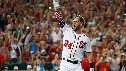 Washington Nationals Bryce Harper reacts to his winning hit during the Major League Baseball Home Run Derby. (Alex Brandon, File)