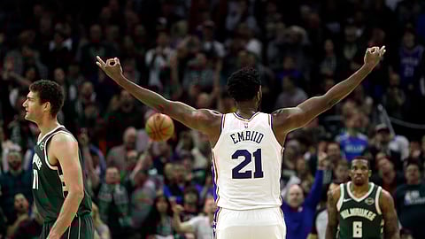 Sixer Joel Embiid (21) reacts after making a shot against the Bucks on Sunday, March 17, 2019, in Milwaukee. The 76ers won 130-125. (AP Photo/Aaron Gash)