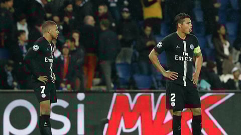 PSG defender Thiago Silva, right, and PSG forward Kylian Mbappe hope to take out their Champions League frustrations on Dijon in Ligue 1 action. (AP Photo/Thibault Camus)