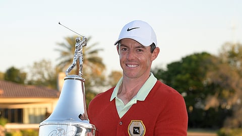 From March 18, 2018, Rory McIlroy poses with the championship trophy after winning the Arnold Palmer Invitational golf tournament in Orlando, Fla. 