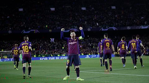 Barcelona’s Lionel Messi celebrates after scoring his side’s third goal during the match between FC Barcelona and Olympique Lyon on March 13, 2019.