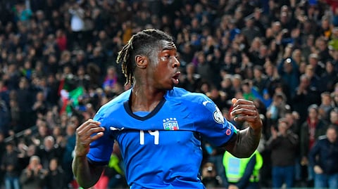 Italy’s Moise Kean celebrates after scoring his side’s second goal during the Euro 2020 qualifying soccer match between Italy and Finland on March 23, 2019. (Alberto Lancia/ANSA via AP)