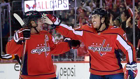 Washington Capitals right wing T.J. Oshie celebrates his goal with center Nicklas Backstrom during a game against the Ottawa Senators (Nick Wass)