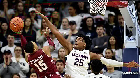 In this March 2019 file photo, Temple’s Nate Pierre-Louis drives on Connecticut’s Josh Carlton.