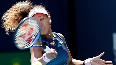 Naomi Osaka returns to Yanina Wickmayer during the Miami Open tennis tournament, Friday, March 22, 2019, in Miami Gardens, Fla. (AP Photo/Lynne Sladky)