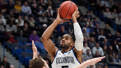 Villanova’s Phil Booth hoots over St. Mary’s Tanner Krebs Thursday (Jessica Hill)