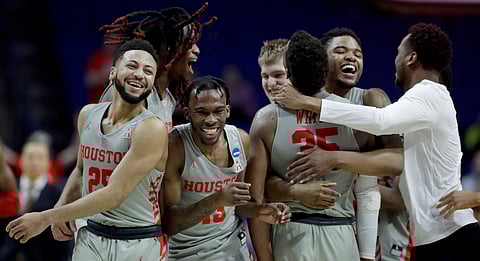 Houston players celebrate after their second-round victory over Ohio State (Charlie Riedel)