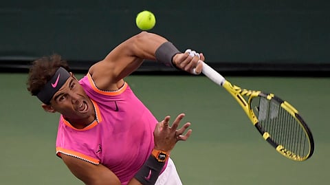 Rafael Nadal, of Spain, serves to Jared Donaldson at the BNP Paribas Open, Sunday, March 10, 2019, in Indian Wells, Calif. (AP Photo/Mark J. Terrill)