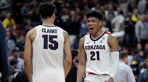 Gonzaga forwards Rui Hachimura and Brandon Clarke celebrate Thursday (Marcio Jose Sanchez)