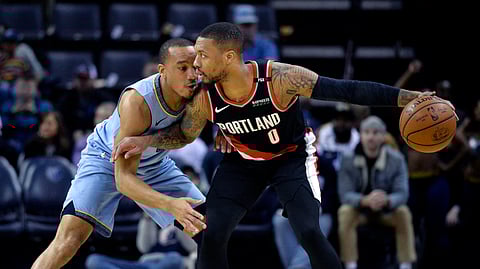 Portland Trail Blazers guard Damian Lillard handles the ball against Memphis Grizzlies on Tuesday, March 5, 2019. (Brandon Dill)