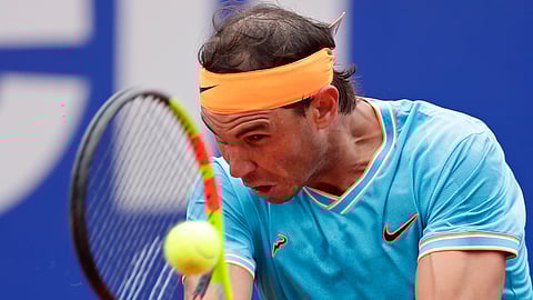 Rafael Nadal returns the ball to David Ferrer during his match at the Barcelona Open, Thursday, April 25, 2019. Nadal won in straight sets. (AP Photo/Manu Fernandez)