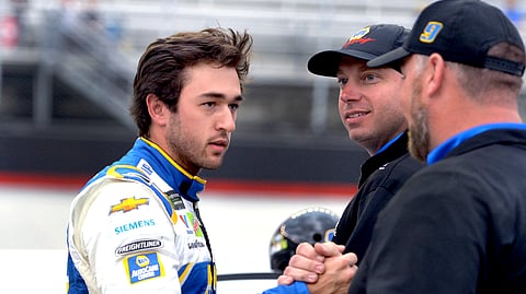 Chase Elliot is congratulated after winning the pole for Sunday’s NASCAR Cup Series auto race at Bristol Motor Speedway. (David Crigger/Bristol Herald Courier via AP)