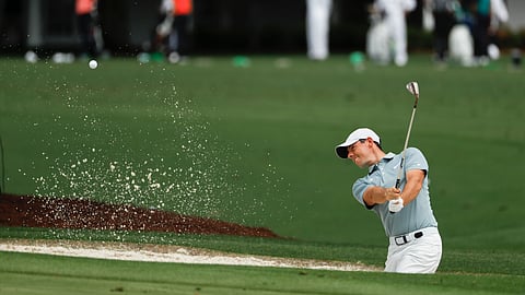 Rory McIlroy, of Northern Ireland, practices on the driving range at the Masters golf tournament Tuesday, April 9, 2019, in Augusta, Ga. (AP Photo/Matt Slocum)