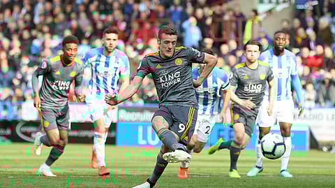 Leicester City’s Jamie Vardy scores against Huddersfield Town during the English Premier League soccer match on April 6, 2019.
