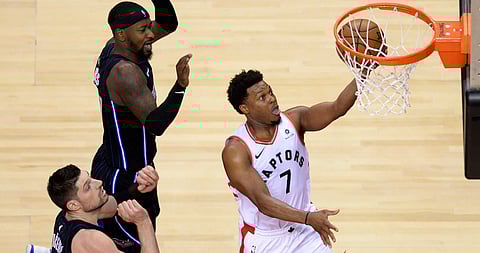 Raptors guard Kyle Lowry scores against the Magic in Game 2 on April 16 (Nathan Denette/The Canadian Press)