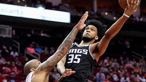 Sacramento Kings forward Marvin Bagley III drives to the basket as Houston Rockets forward PJ Tucker defends during the NBA basketball game on March 30, 2019,.
