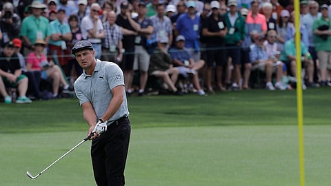 Bryson DeChambeau hits on the first hole during the second round for the Masters golf tournament on April 12, 2019.