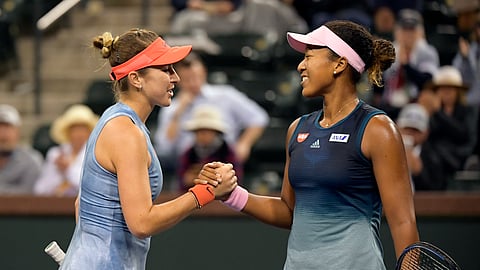 Belinda Bencic, left, beat Naomi Osaka March 12, 2019 in Indian Wells. In Charleston, she’ll play American Allie Kick. (AP Photo/Mark J. Terrill)