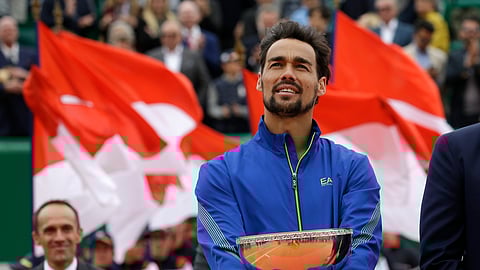 Italy’s Fabio Fognini poses with a trophy after defeating Serbia’s Dusan Lajovic in the men’s singles final match of the Monte Carlo Tennis Masters. (AP Photo/Claude Paris)