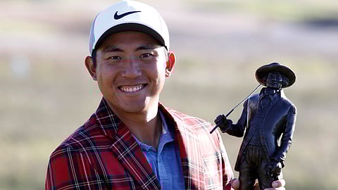 C.T. Pan holds his trophy after winning the RBC Heritage golf tournament at Harbour Town Golf Links on Hilton Head Island, S.C., on April 21, 2019. Pan won with a 12-under par for his first PGA victory.
