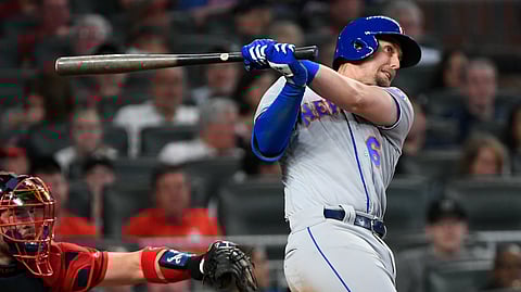 New York Mets’ Jeff McNeil watches two-run double to right field during the fourth inning Friday (John Amis)