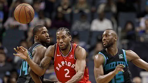Kawhi Leonard (2) will now be chasing a championship for the Toronto Raptors. (AP Photo/Chuck Burton)