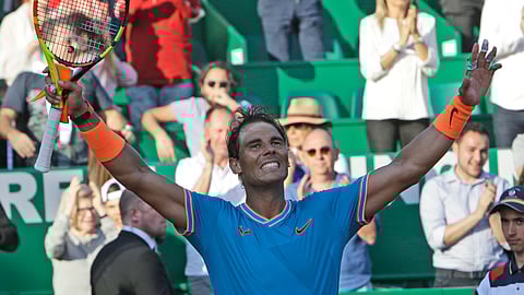 Spain’s Rafael Nadal waves as he defeats Argentina’s Guido Pella during their quarterfinal match of the Monte Carlo Tennis Masters tournament in Monaco, Friday, April 19, 2019. (AP Photo/Claude Paris)