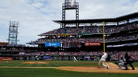 Philadelphia Phillies’ Rhys Hoskins hits an RBI-double off Miami Marlins starting pitcher Pablo Lopez during the first inning of a baseball game on April 28, 2019.