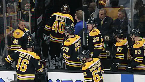 Bruins leave the ice following their Game 1 loss to the Maple Leafs Thursday in Boston (Charles Krupa)