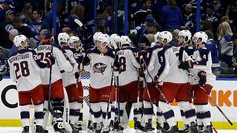 The Columbus Blue Jackets celebrate a win.