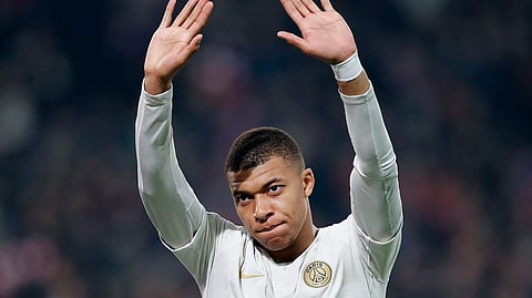 PSG’s Kylian Mbappe waves to supporters after his team lost the French League One soccer match between OSC Lille and Paris Saint-Germain at Stade Pierre Mauroy in Lille, France, Sunday, April 14, 2019.(AP Photo/Christophe Ena)