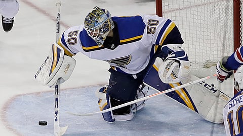Blues’ Jordan Binnington stops a shot on the goal by the Rangers in March (Frank Franklin II)
