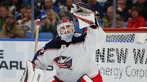 Columbus Blue Jackets goalie Sergei Bobrovsky makes a glove-save during the third period of the game against the Buffalo Sabres on March 31, 2019.