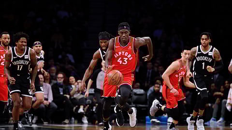 Toronto’s Pascal Siakam heads down court against the Nets Wednesday (Kevin Hagen)