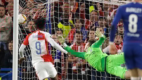 Chelsea goalkeeper Kepa Arrizabalaga fails to stop Slavia’s Petr Sevcik’s second goal during the Europa League quarterfinal, second leg, in London, Thursday, April 18, 2019. (AP Photo/Matt Dunham)
