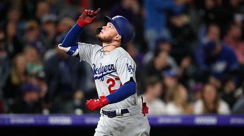 Dodgers’ Alex Verdugo gestures as he crosses home plate after hitting a solo home run Saturday (David Zalubowski)