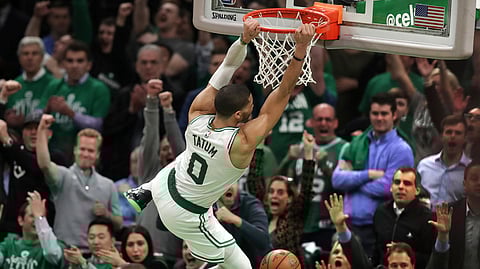 Boston Celtics forward Jayson Tatum dunks against the Indiana Pacers in the final minute of Game 2 of a first-round NBA playoff series. (AP Photo/Charles Krupa)